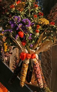 Combine ornamental corn with dried flowers and other items for natural seasonal decorations.