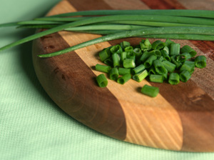 Chopped chives ready to be used as a garnish.