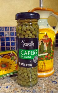 Capers are the pickled unopened flower buds of the plant Capparis spinosa.
