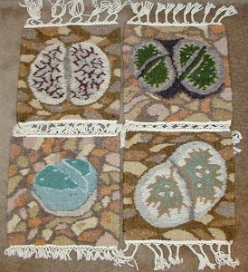 Weavings with lithops designs, by Karakulia Weavery, Swakopmund, Namibia.