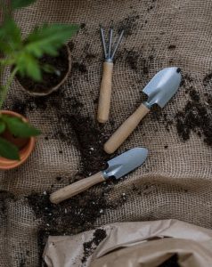 Image of top down view of gardening tools on burlap