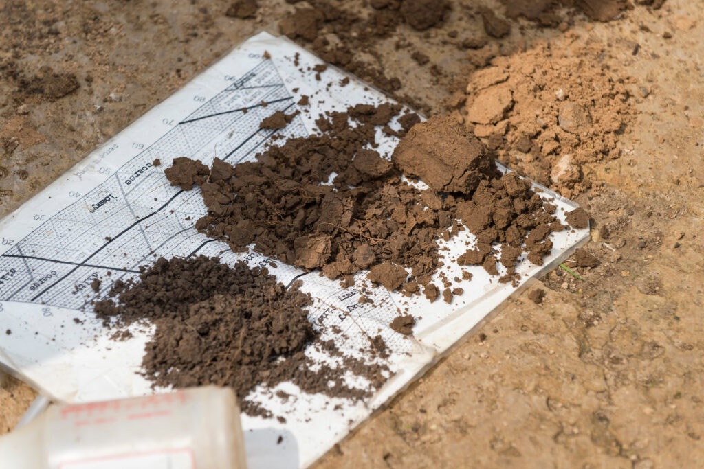 Layered features of vertically exposed prairie soil are pictured during a soil science class field trip to the University of Wisconsin-Madison's Arlington Agricultural Research Station on May 27, 2014. (Photo by Jeff Miller/UW-Madison)